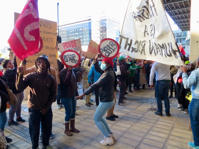Affordable housing activists protest outside Cape Town International Convention Centre