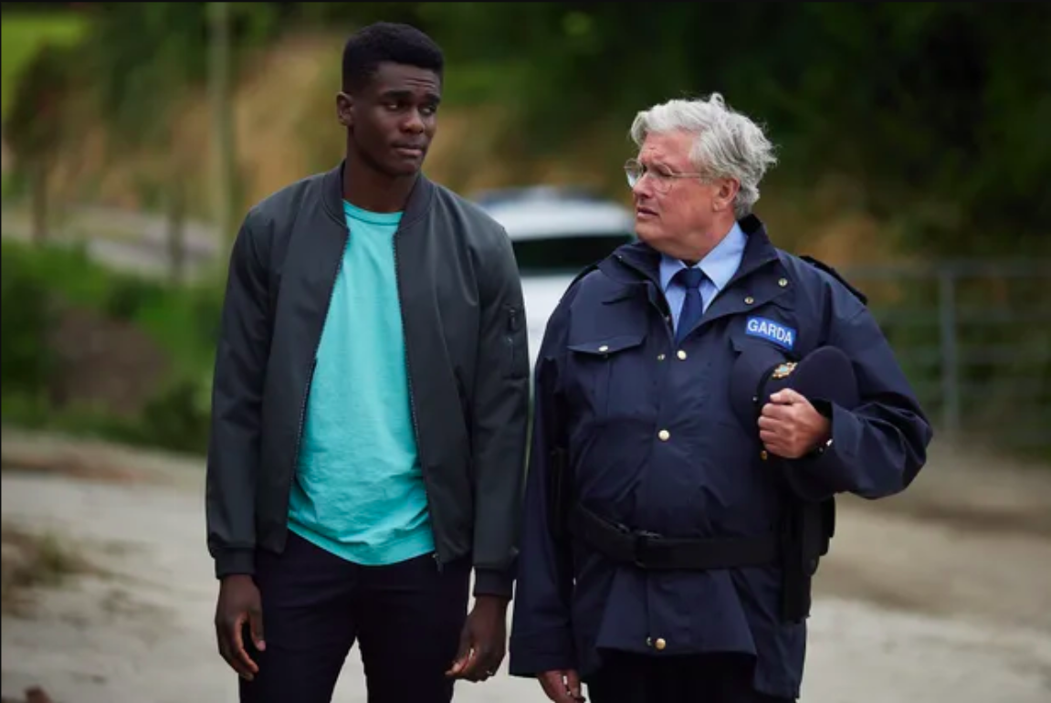 ‘Holding’ – Clinton Liberty as Linus Dunne and Conleth Hill as Sergeant PJ Collins (image courtesy of Britbox)