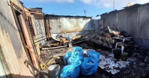 Community accuses rolling blackouts for deaths of young couple in shack fire