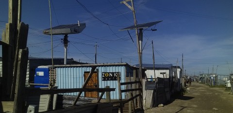 Cloud hangs over private solar power initiative as shack dwellers unable to afford monthly fees