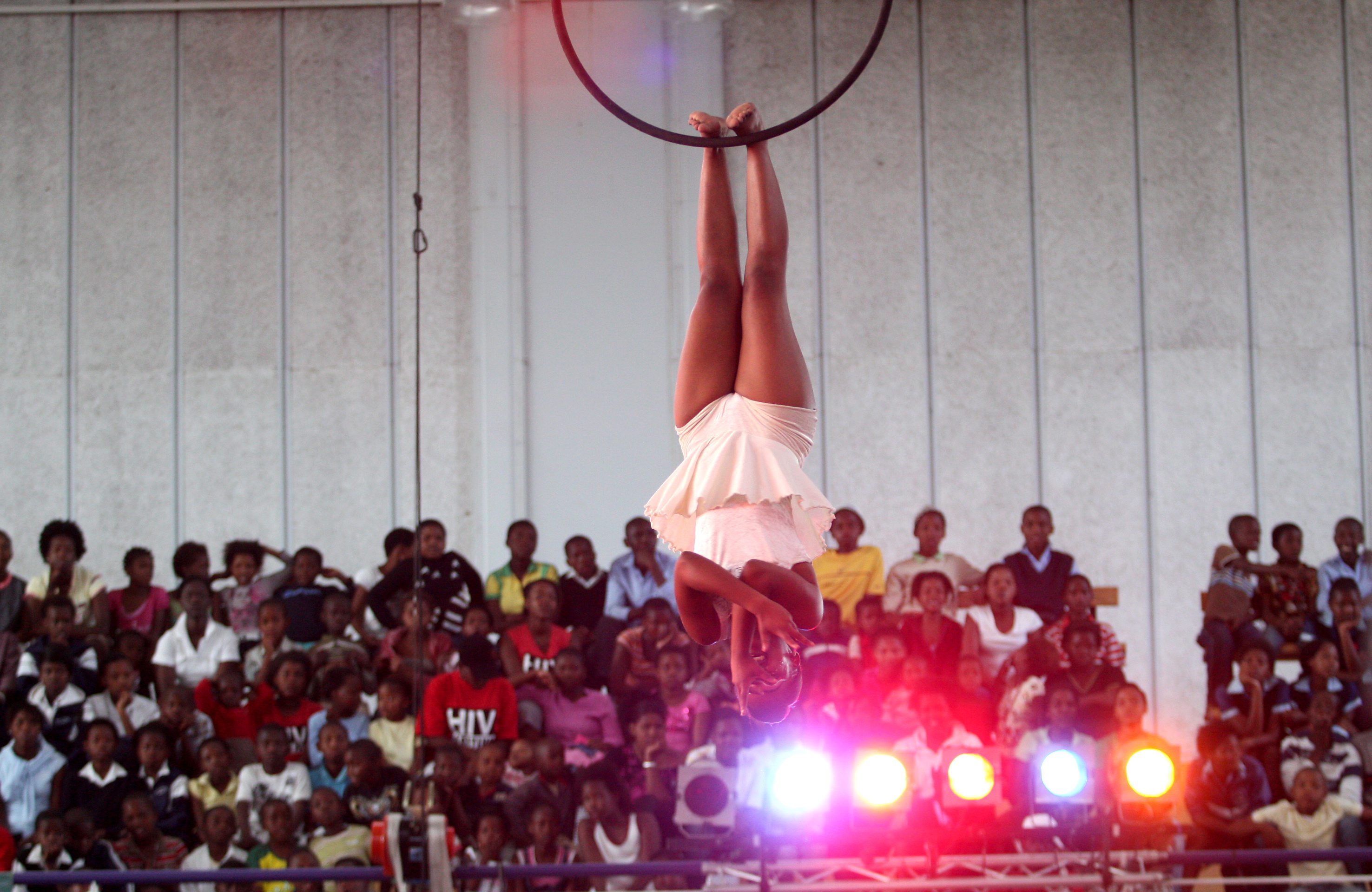 CAPE TOWN, SOUTH AFRICA  1 December 2009: The Zip Zap Circus School marks World Aids Day by celebrating 'Living Positively' through a special Zip Zap circus show starring HIV-positive children at the OR Tambo Hall on December 1, 2009, where 2000 children from Khayelitsha attended. (Photo by Gallo Images/Foto24/Taryn Carr)