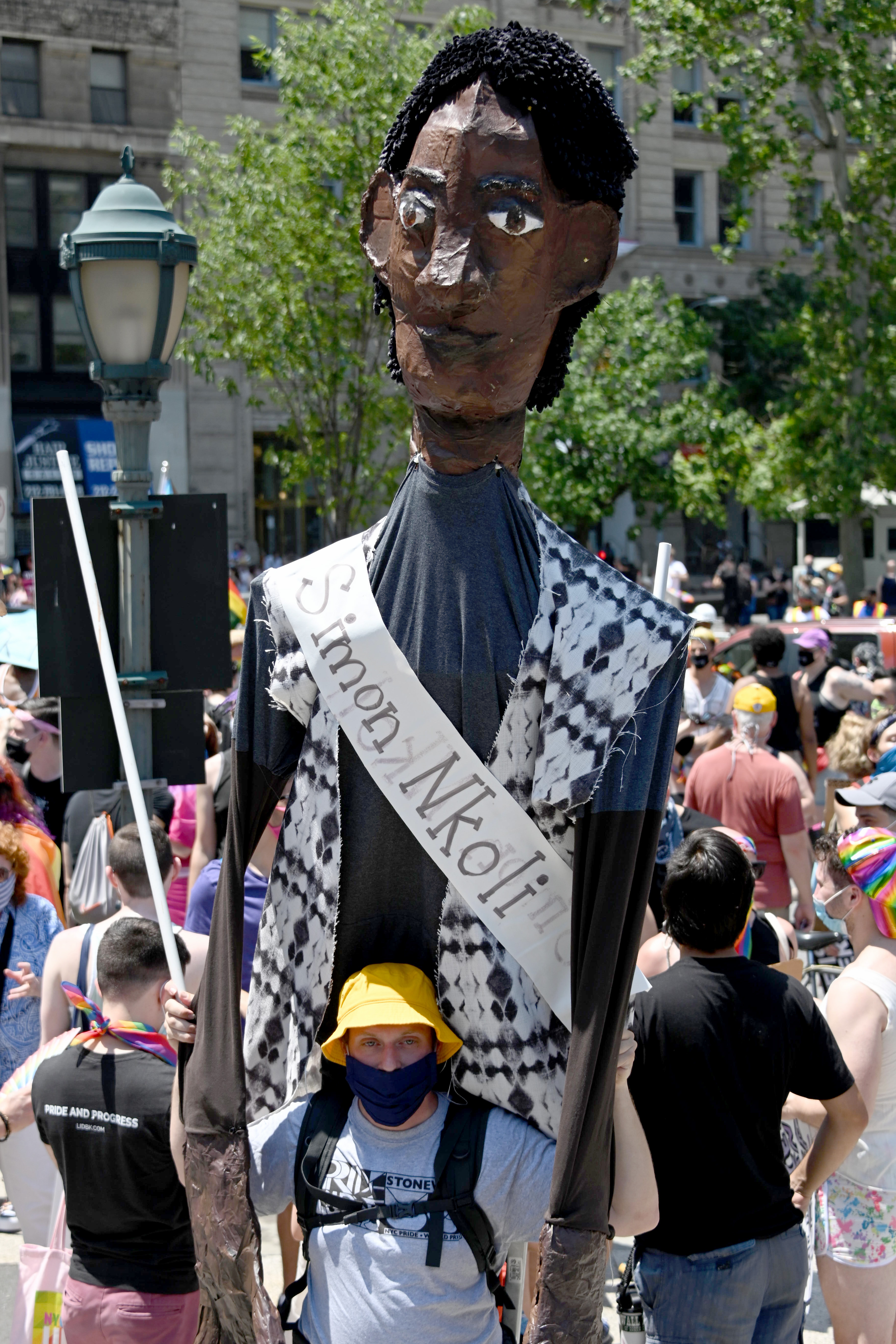 NEW YORK, NEW YORK - JUNE 28: A person wears a Simon Nkoli puppet by artist Chris Williams at the Queer Liberation March for Black Lives & Against Police Brutality on June 28, 2020 in New York City. Due to the ongoing coronavirus pandemic, this year's Pride march had to be canceled over health concerns. The annual event, which sees millions of attendees, marks its 50th anniversary since the first march following the Stonewall Inn riots. (Photo by Alexi Rosenfeld/Getty Images)