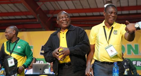 President Cyril Ramaphosa and newly-appointed deputy president Paul Mashatile embrace following the announcement of the top seven during the ANC's 55th national conference at Nasrec in Johannesburg, South Africa on 19 December 2022. (Photo: Emilie Gambade)