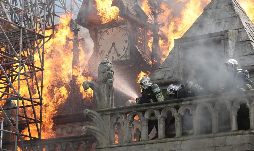 Firefighters battle the blaze at Notre-Dame. Production still from 'Notre-Dame On Fire'. Image: courtesy of Universal Studios
