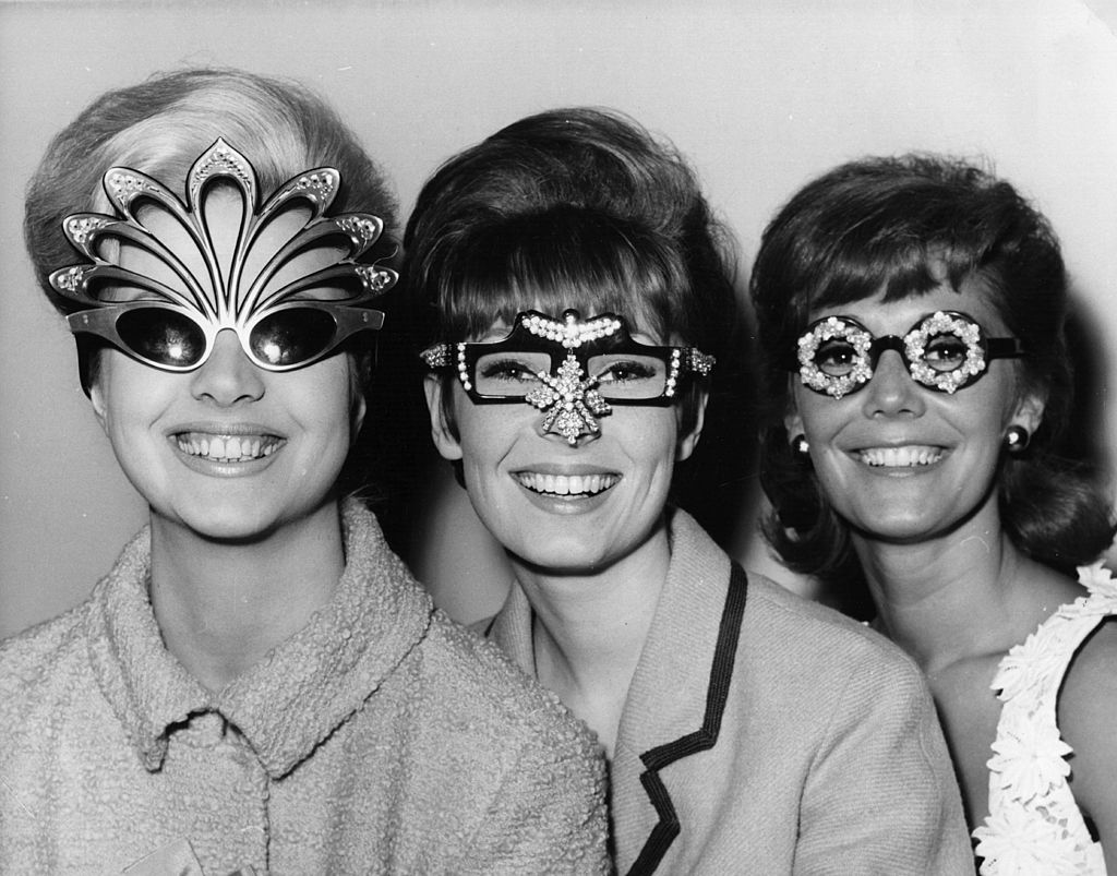 Three models at the Fashion and Spectacle Show, at the Mount Royal Hotel, London, seen wearing unusual spectacles. (Photo by Reg Speller/Getty Images)