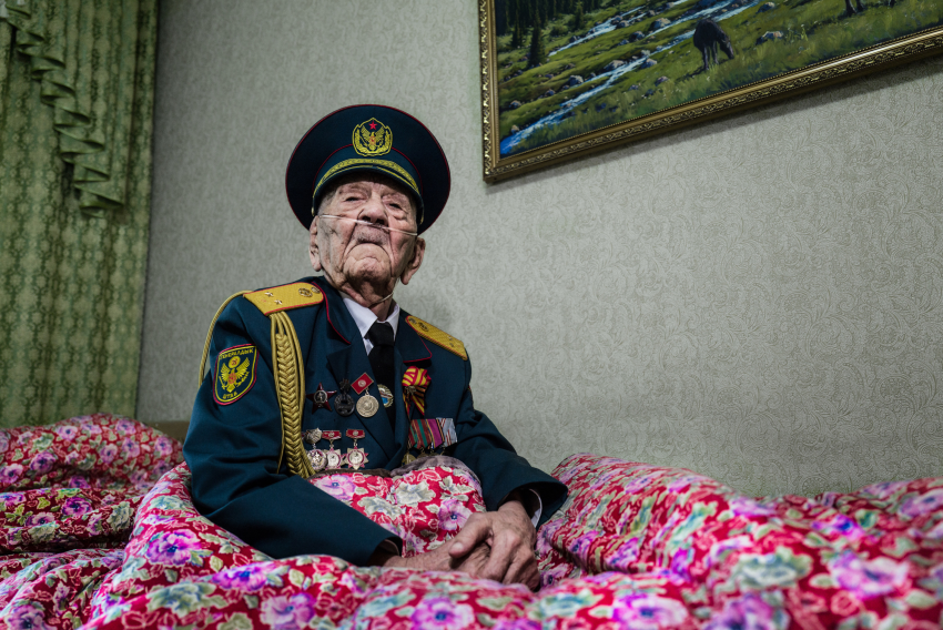 'Portrait of a Veteran, Bishkek, Kyrgyzstan, May 2022'. World War 2 veteran Acek Urmanbetov (98) is recovering from Covid. He is reluctant to evoke the war, but remembers the leg he lost in Belarus, the people he shot and the dead rotting in the trenches. He follows international politics and is devastated by Ukraine’s current war. In 2022, much of the world reopened, and I could finally continue some of my long-term projects that had been interrupted by the Covid crisis. These images are a collection of contrasting moments found on the way: a Cuban actress shines in the Havana night; a woman about to turn 100 recalls the Soviet famine that took her father; a young girl crowned with dandelions embodies the spirit of youth. 2022 was a cruel year in many ways, but the possibility of encountering people again and listening to their stories was genuine solace. © Marylise Vigneau, France, Finalist, Professional competition, Portfolio, Sony World Photography Awards 2023
