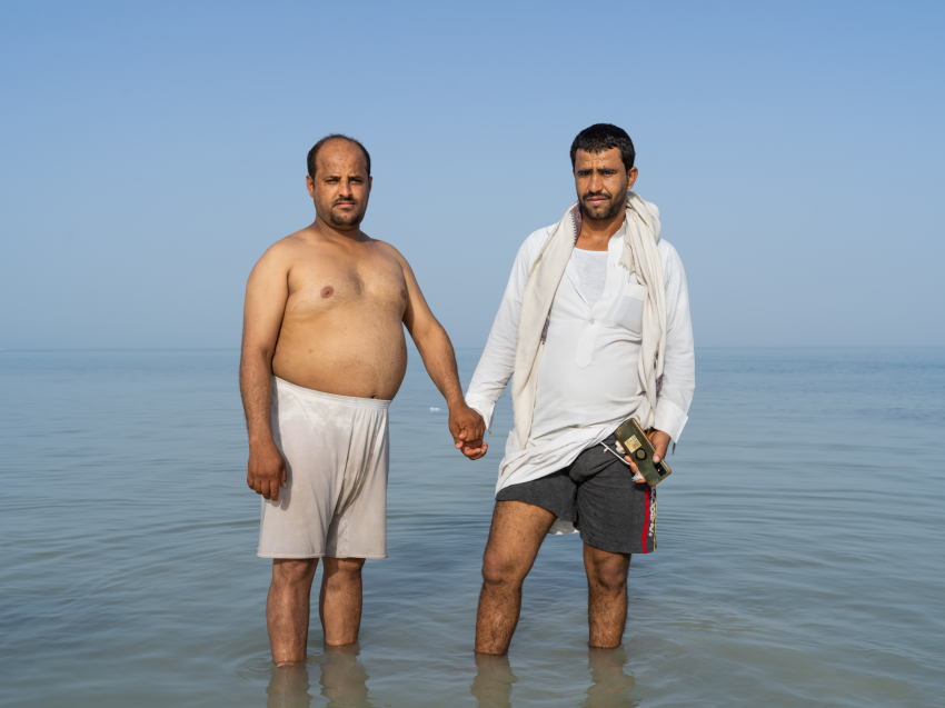 Two migrant workers at the beach during Eid celebrations. Eid is a holiday for all in Saudi and the beaches are full of people from all walks of life, although most say it is still too cold to swim. This portfolio was shot in the first half of 2022 in Saudi Arabia, where I was based at the time. Given more time, I think these pictures would have fallen into more defined projects or narratives, perhaps relating to the large migrant worker and expat population (of which I was part), or Saudi car culture. As it is, I believe this collection shows my style and technique as a photographer – there is no deliberate connection between the images other than I was searching for special photographs that could eventually develop into projects. © James Deavin, United Kingdom, Finalist, Professional competition, Portfolio, Sony World Photography Awards 2023 