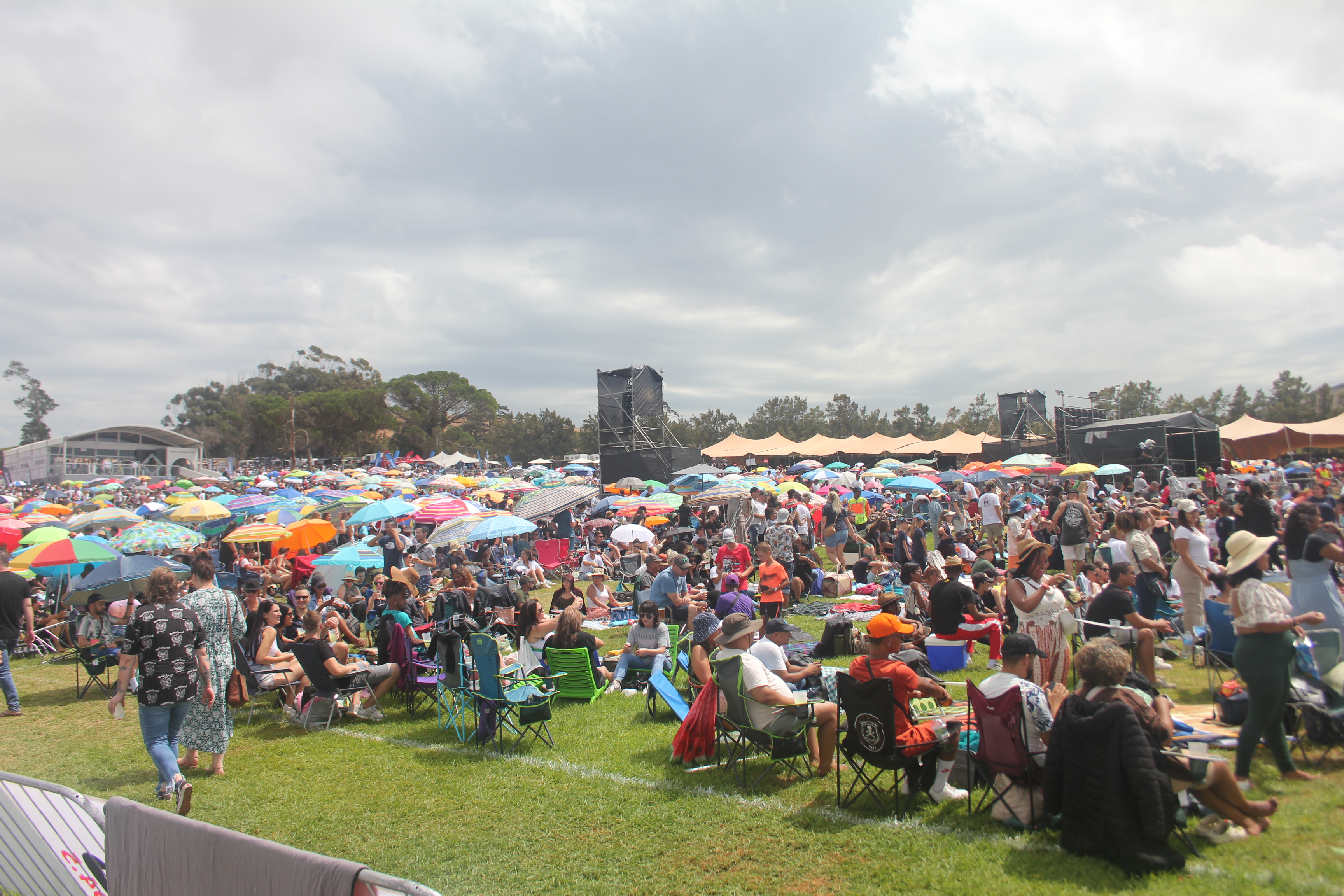 The crowd and their umbrellas stretched across the entire venue at the Galaxy KDay Festival. Image: An Wentzel