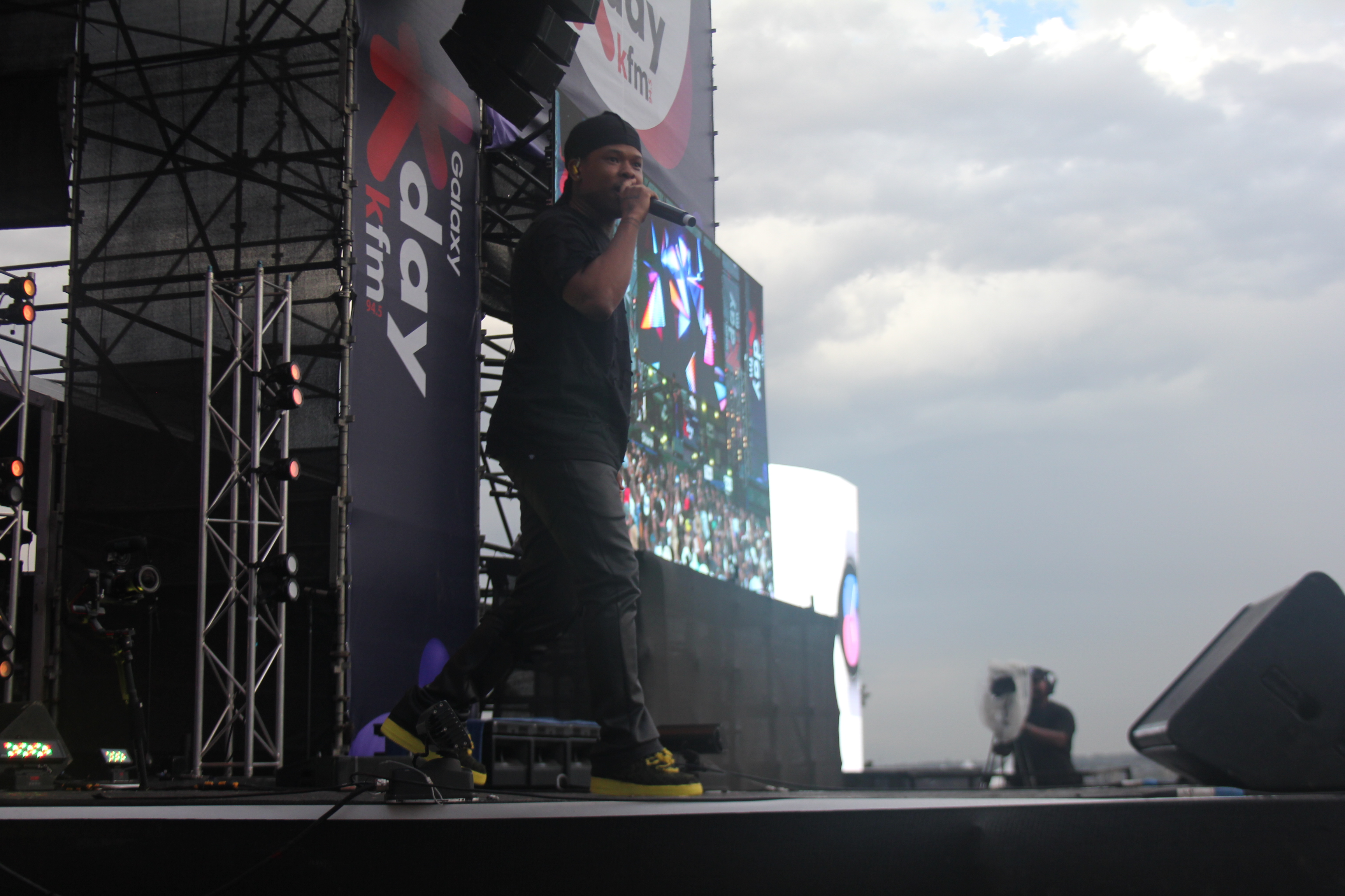 Nasty C comes to the stage amid the screams of the crowd at the Galaxy KDay Festival. Image: Oren-Andrew Wentzel