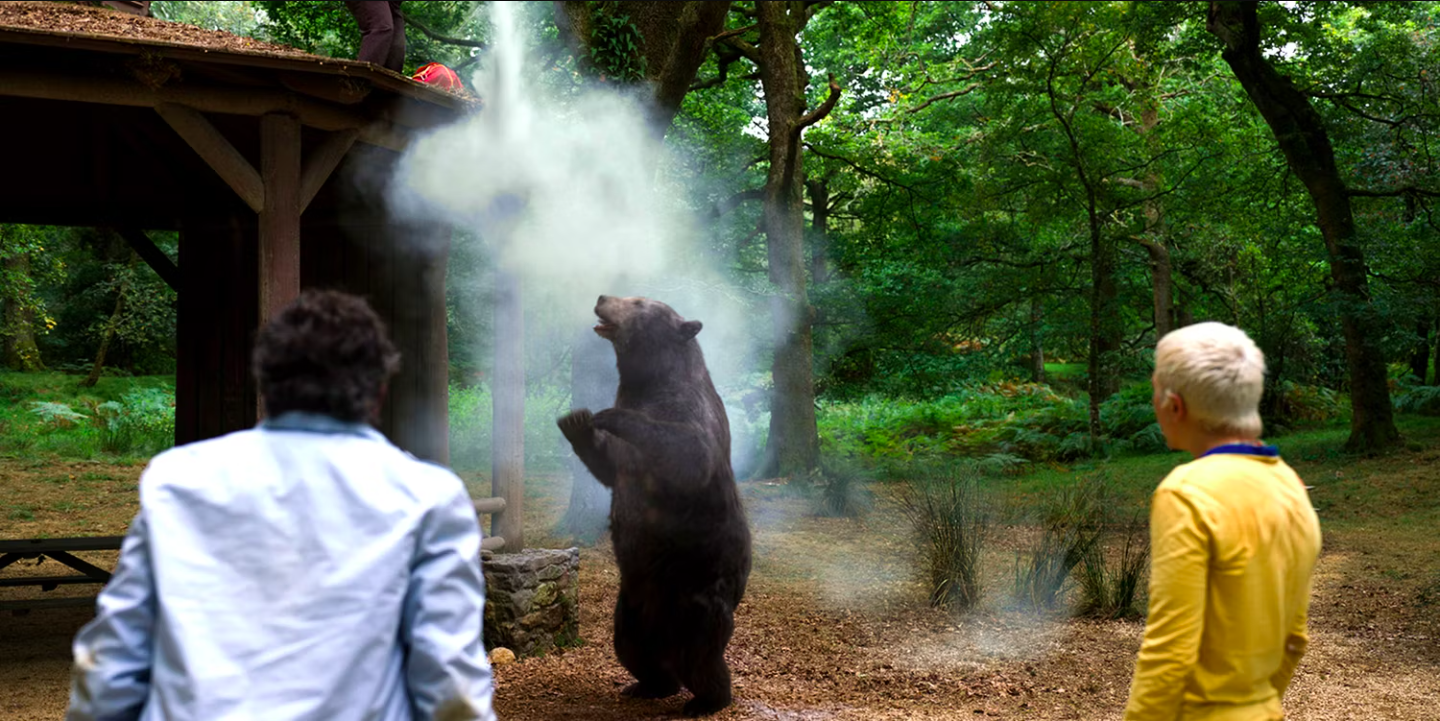 Cocaine Bear dances in a shower of cocaine. Image: courtesy of Universal Pictures