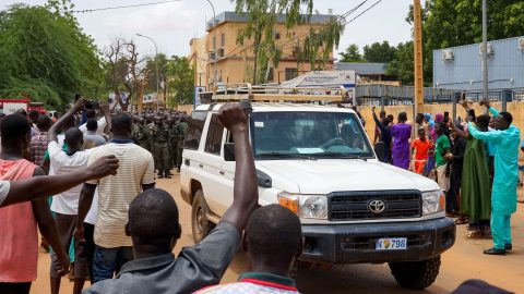 West Africa threatens force on Niger coup leaders, French embassy attacked