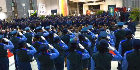 Law Enforcement Officers salute during the national anthem at the memorial service of two officers at Cape Town Civic Centre on 14 August 2023. (Photo: Ziyanda Duba)