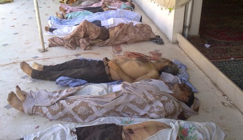 Assad’s forces accused of massacre near Syrian capital