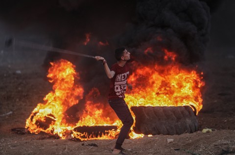 Tens of thousands protest on Gaza border, 37 dead in clashes